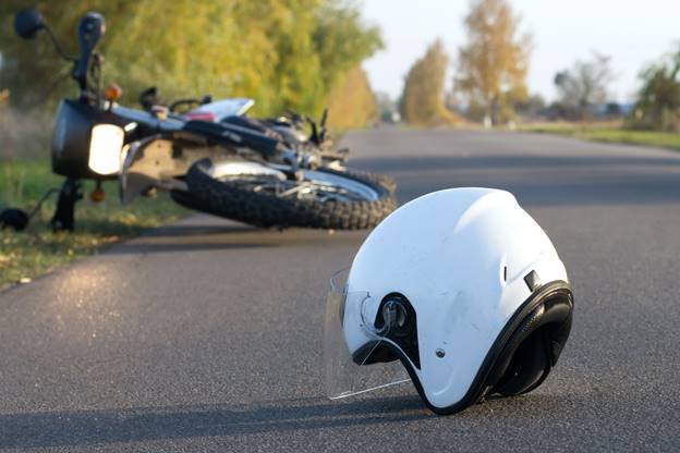 A motorcycle crash on the road
AI-generated content may be incorrect.